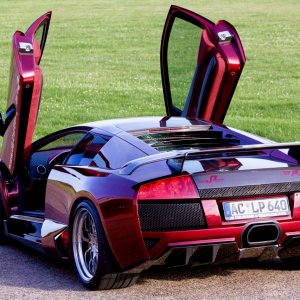 2009-Lamborghini-Murcielago-LP640-JB-R-Rear-Angle-Door-Open-View